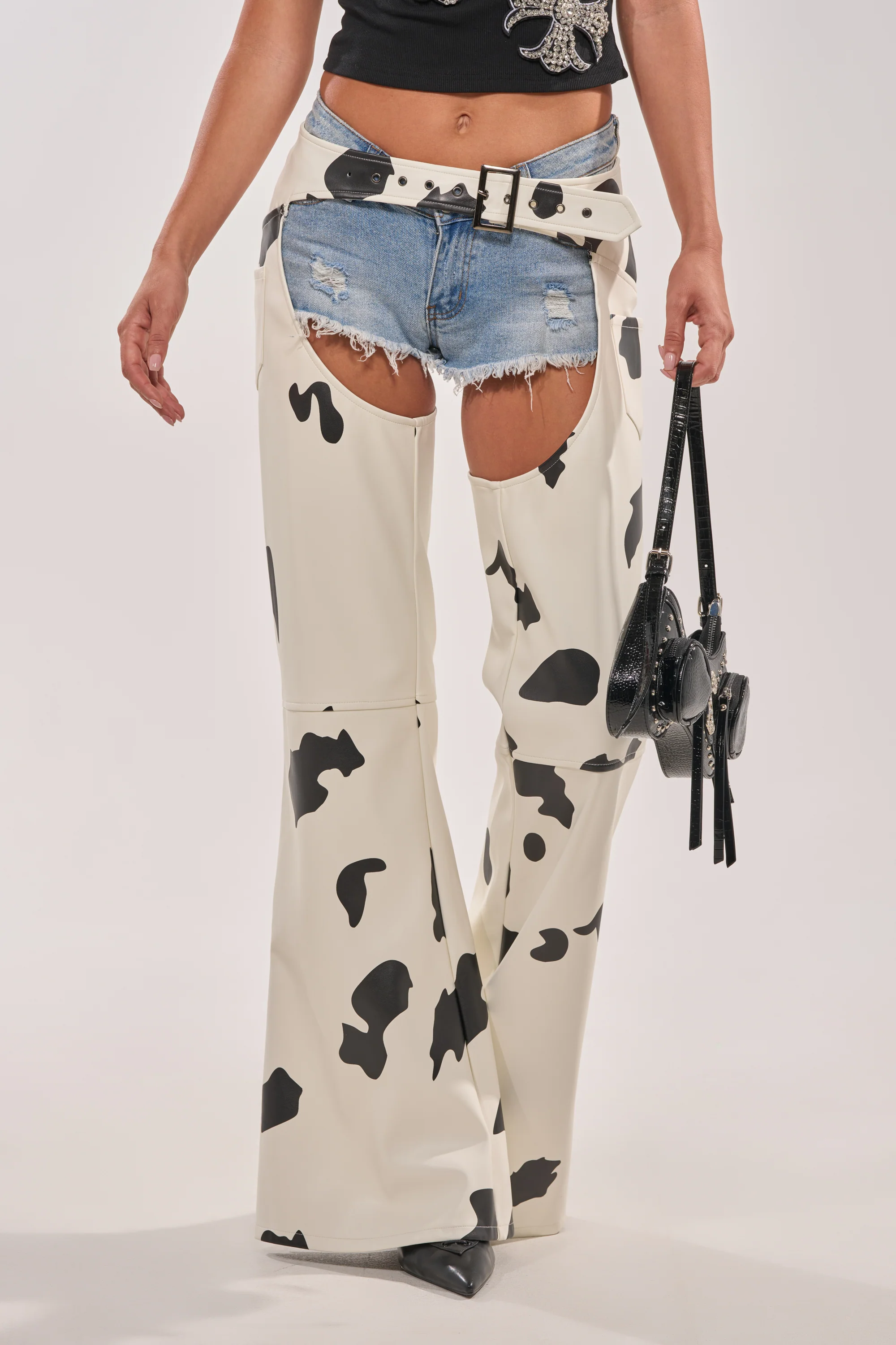 MOO OVER COW PRINT FAUX LEATHER CHAPS - Image 5